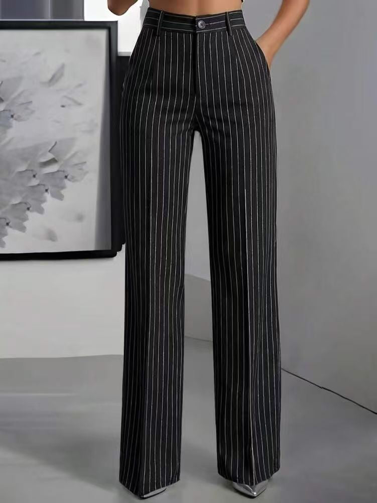 Pantaloni sartoriali a vita alta, a righe verticali e gamba larga