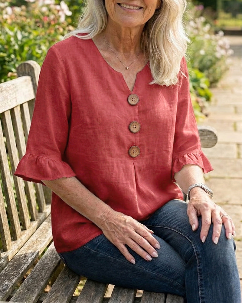 Blusa Sofia in cotone-lino liscio con bottoni effetto legno e volant