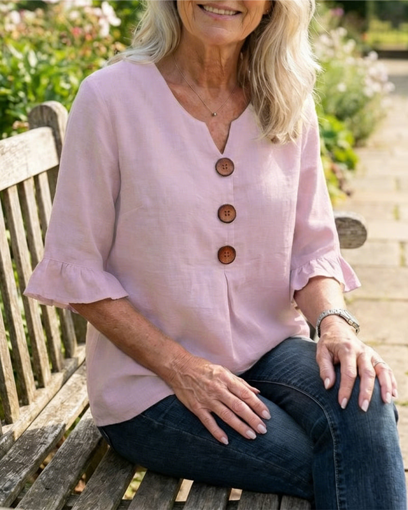 Blusa Sofia in cotone-lino liscio con bottoni effetto legno e volant
