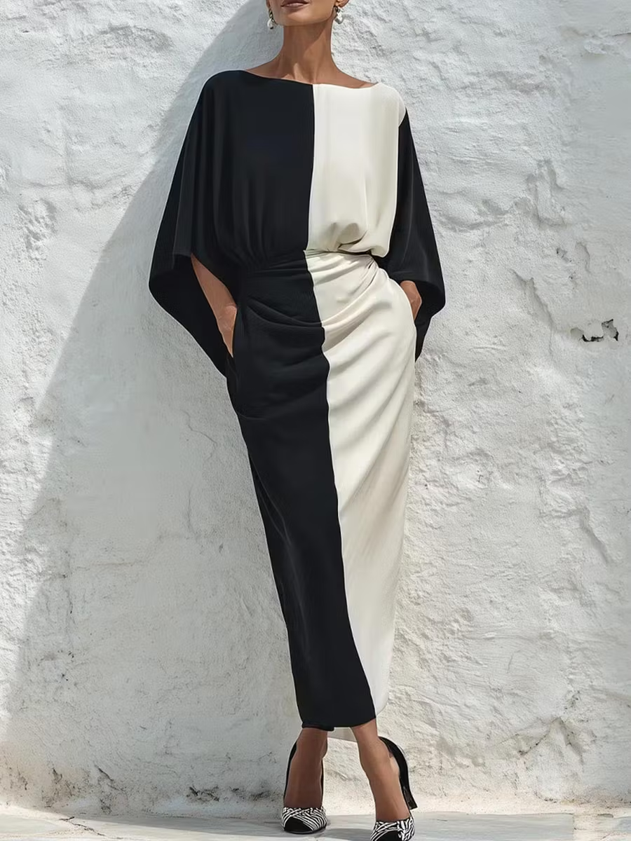 Completo due pezzi composto da un top e una gonna midi con contrasto di colori bianco e nero