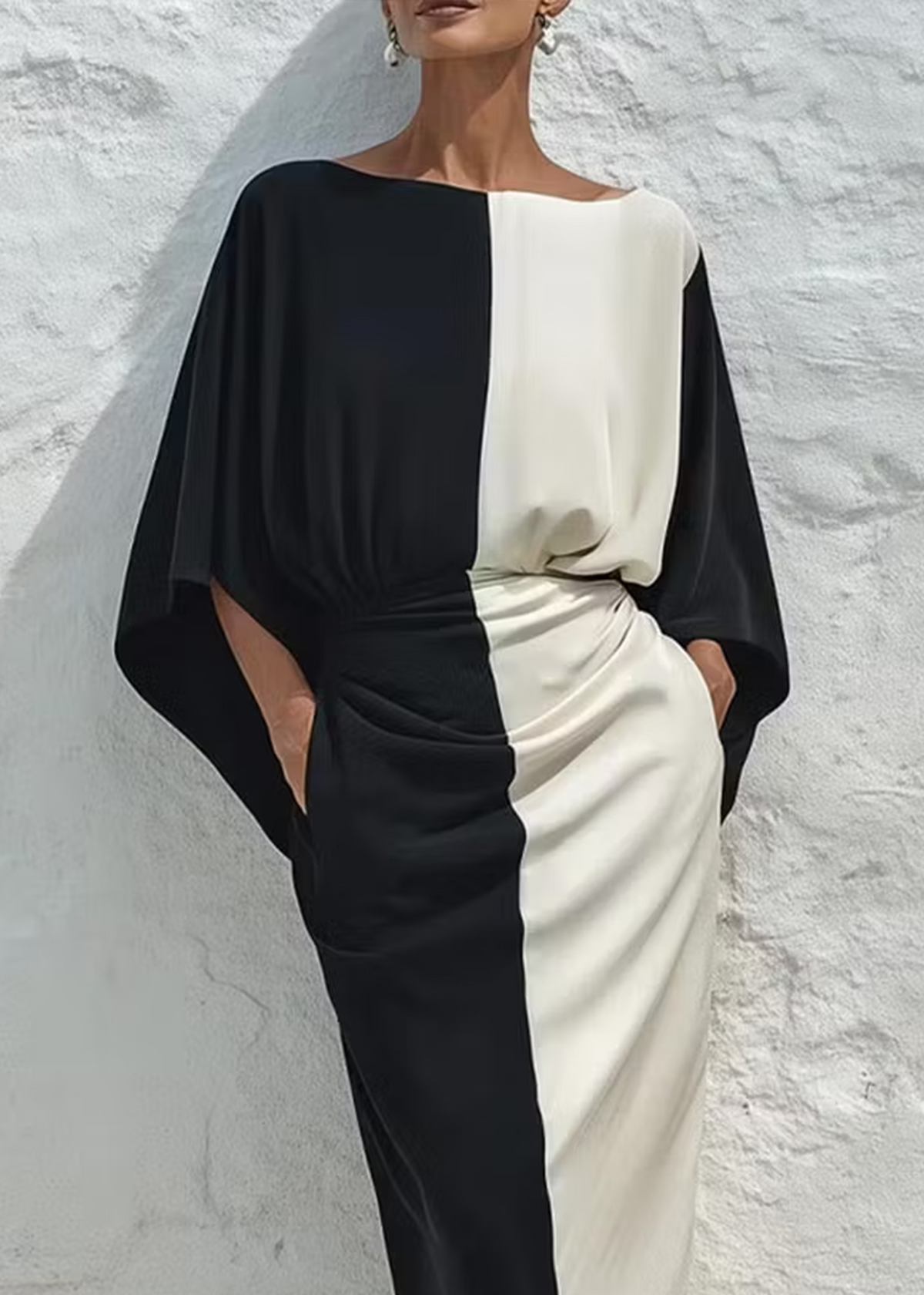 Completo due pezzi composto da un top e una gonna midi con contrasto di colori bianco e nero