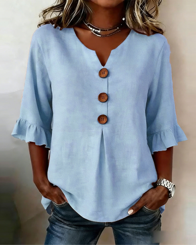 Blusa Sofia in cotone-lino liscio con bottoni effetto legno e volant