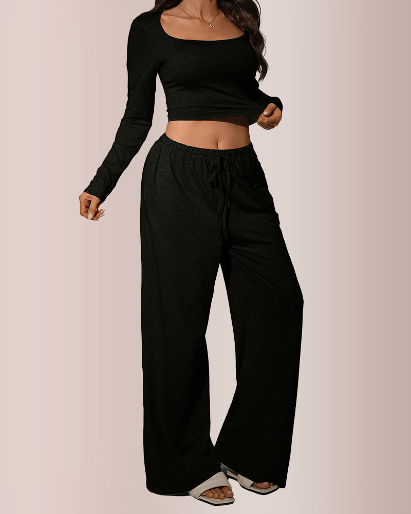 Completo con top corto e pantaloni a gamba larga
