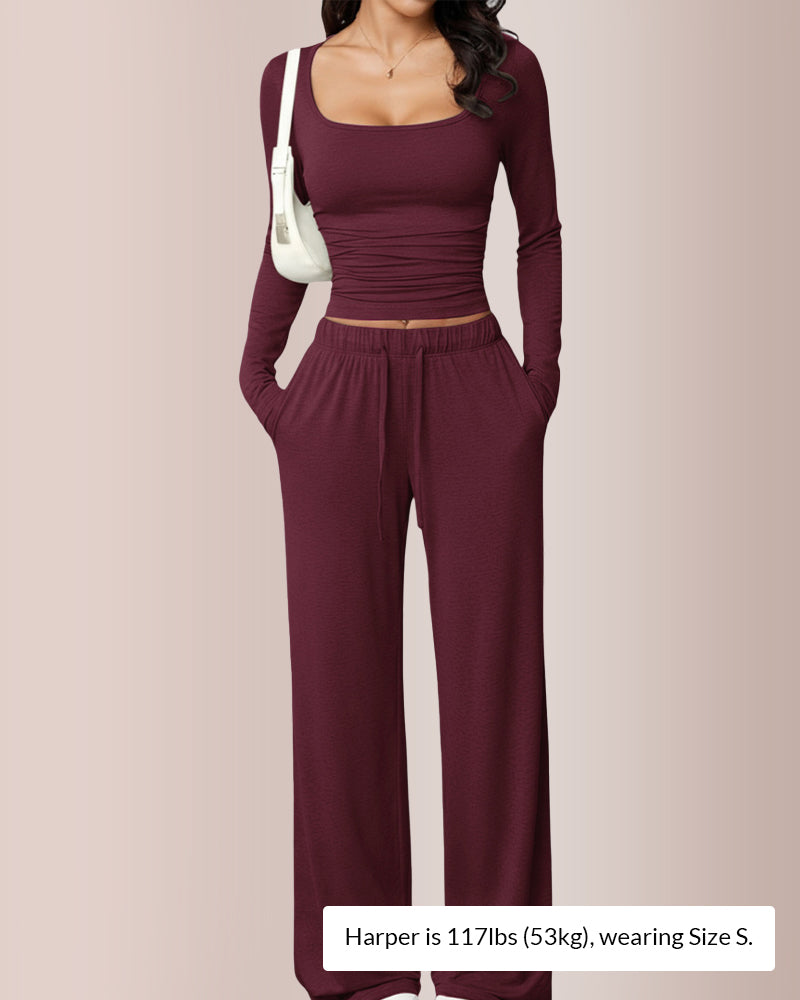 Completo con top corto e pantaloni a gamba larga