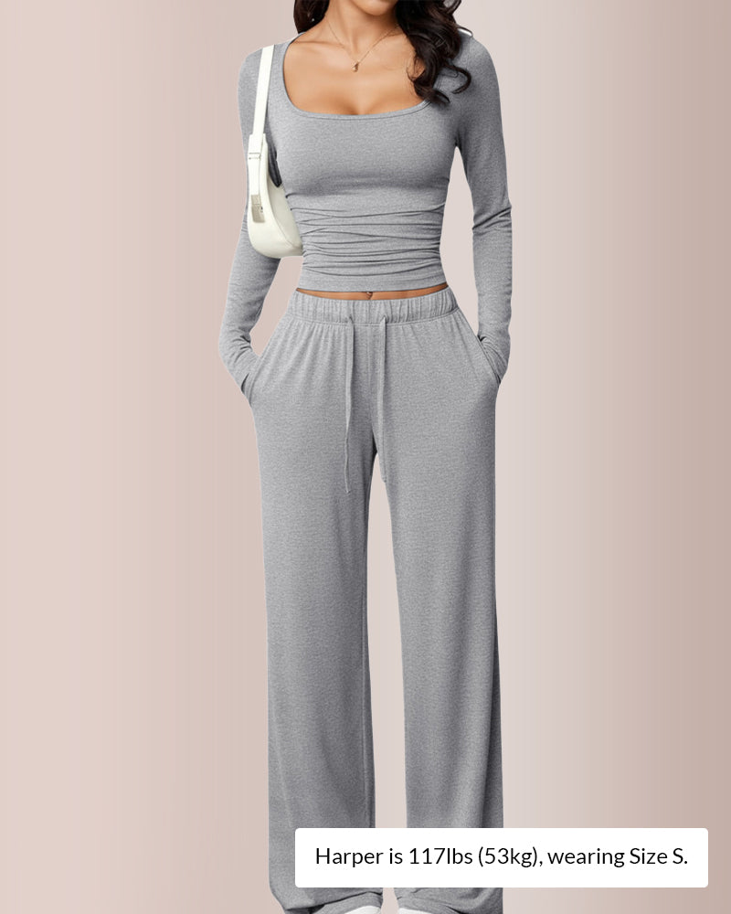 Completo con top corto e pantaloni a gamba larga
