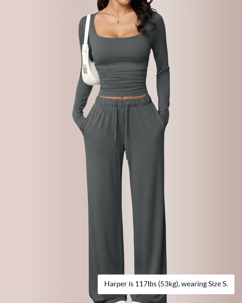 Completo con top corto e pantaloni a gamba larga
