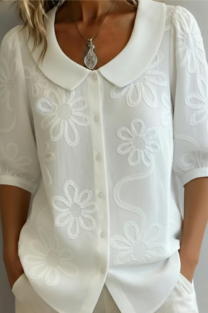 Elegante blusa floreale