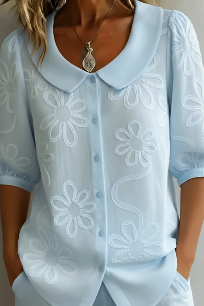 Elegante blusa floreale