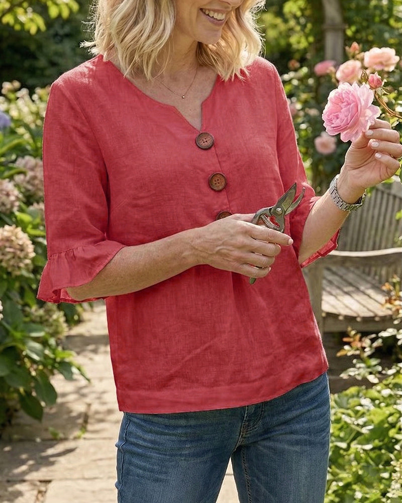 Blusa Sofia in cotone-lino liscio con bottoni effetto legno e volant