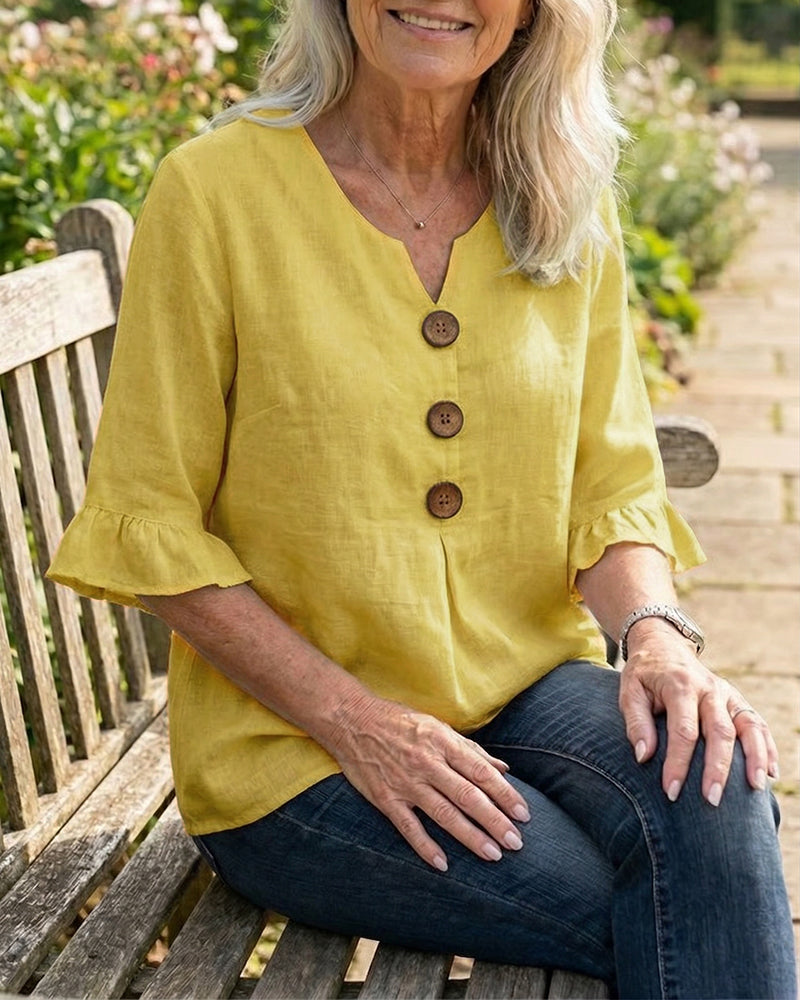 Blusa Sofia in cotone-lino liscio con bottoni effetto legno e volant