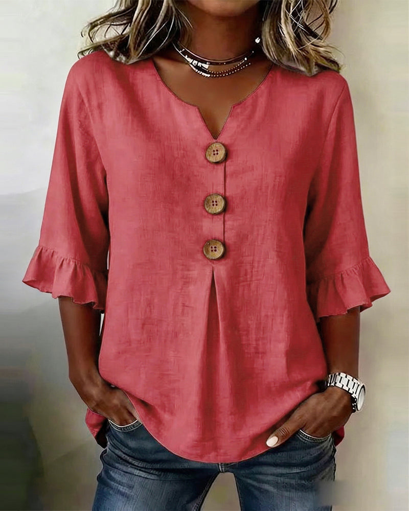 Blusa Sofia in cotone-lino liscio con bottoni effetto legno e volant